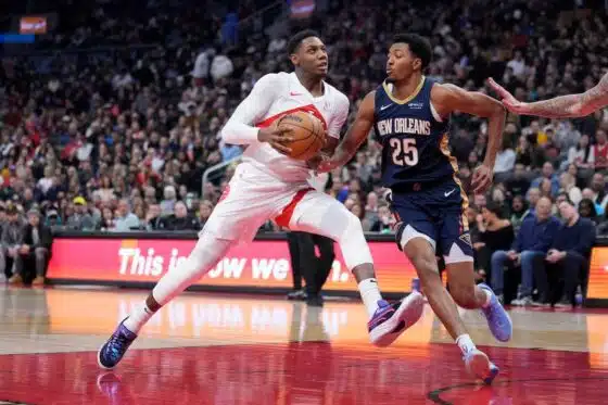 RJ Barrett drives against Trey Murphy